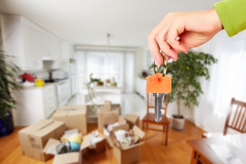 Moving team pricing a storage job for a flat near a busy St Johns Wood street